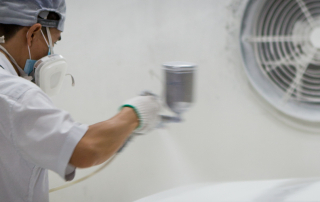 Painting surfboards on Sunkite surfboards factory